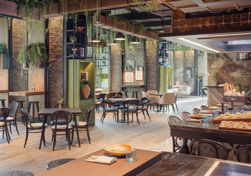 A family dining at Stock.Room at Kimpton Maa-Lai Bangkok